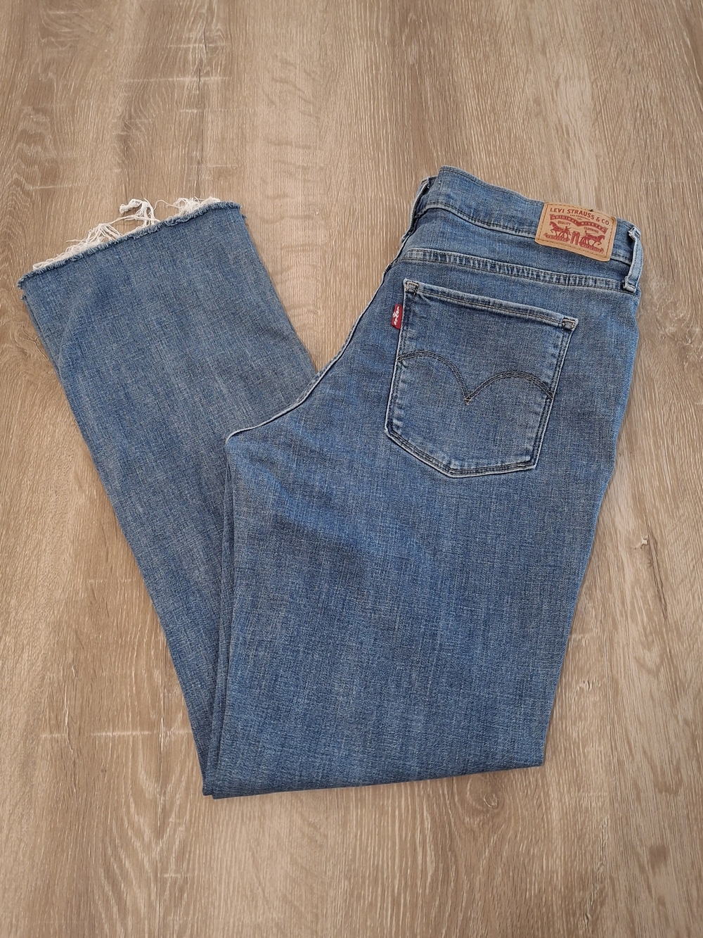 Levi's 315 Shaping Bootcut Jeans Women's 31x34 Medium Blue Raw Hem